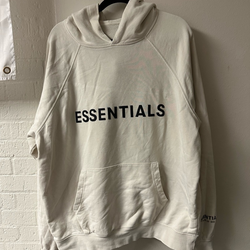 Essentials Cream Pullover Hoodie with Black Logo